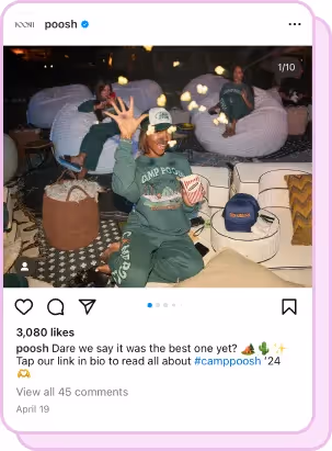 person in green sweatsuit throwing popcorn in air during camping event at coachella