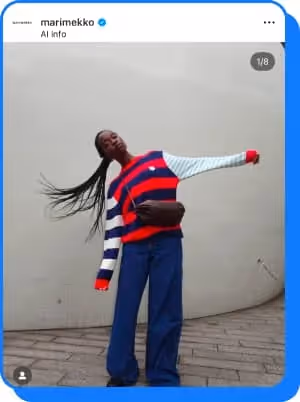 girl wearing navy and red striped marimekko sweater