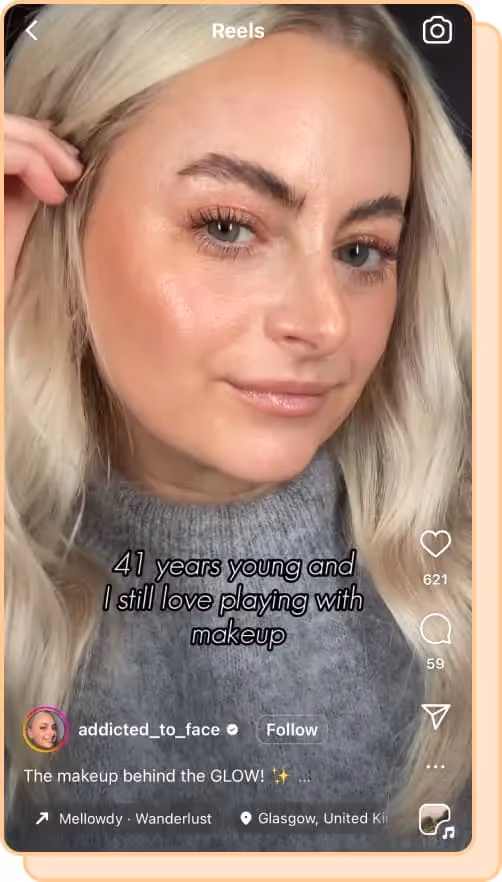 woman with blonde hair grey turtleneck shows off glowy makeup