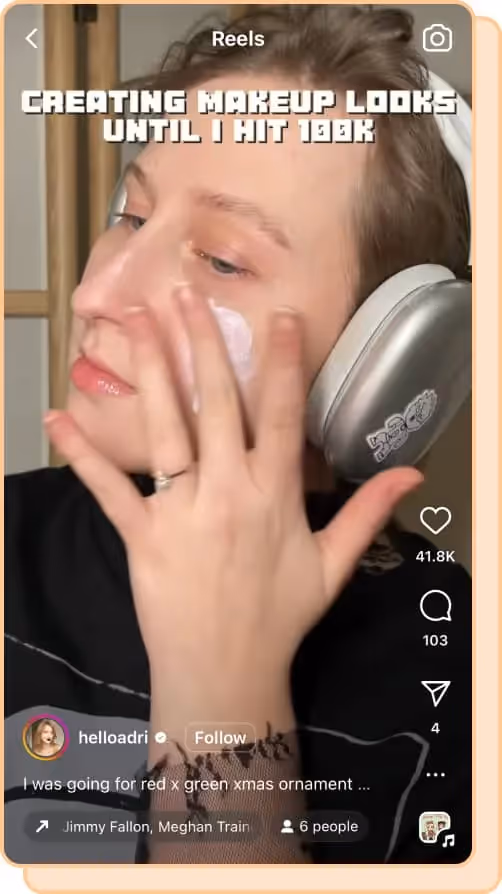 person apply moisturizer wearing silver headphones