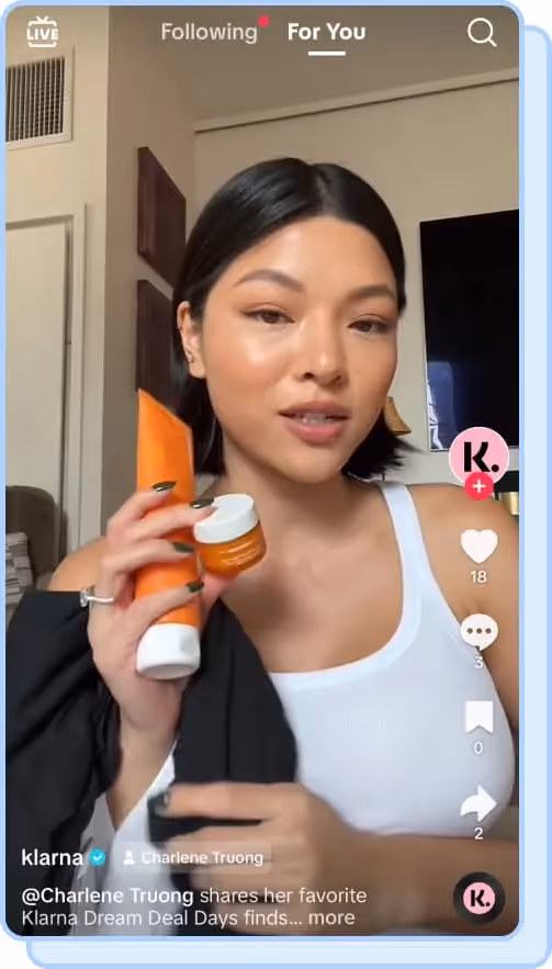 influencer holdsing ole henriksen skincare products on tiktok for klarna