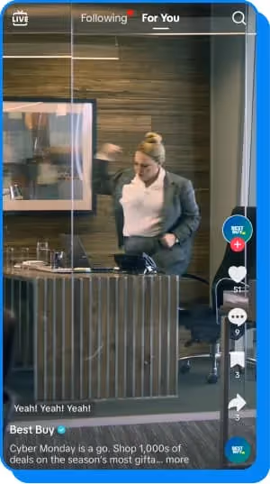 woman pumping fist in best buy commercial