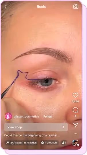 woman applying creative unconvential purple eyeliner
