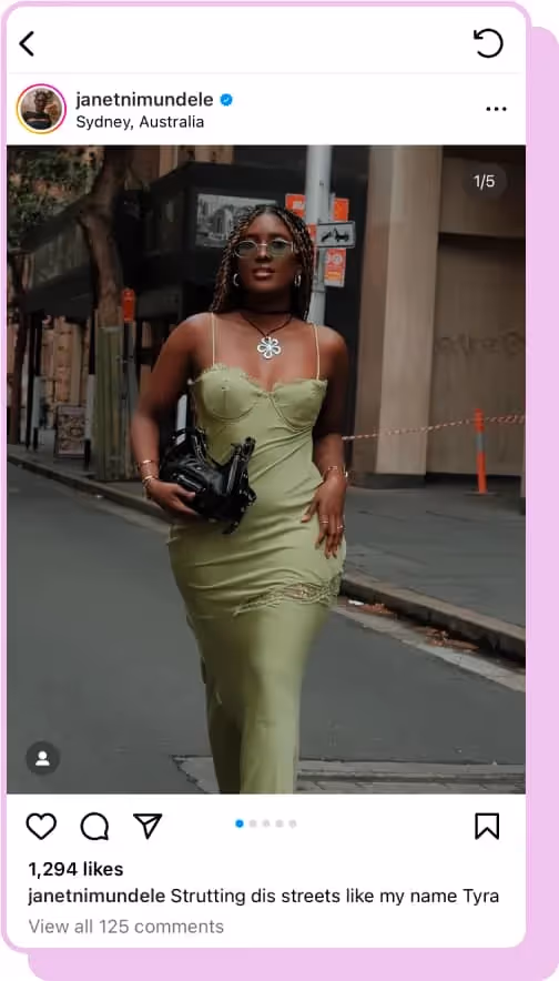 woman wearing green silk dress walking down street ig screenshot