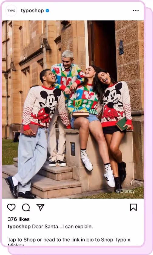 group of people wearing mickey mouse sweaters