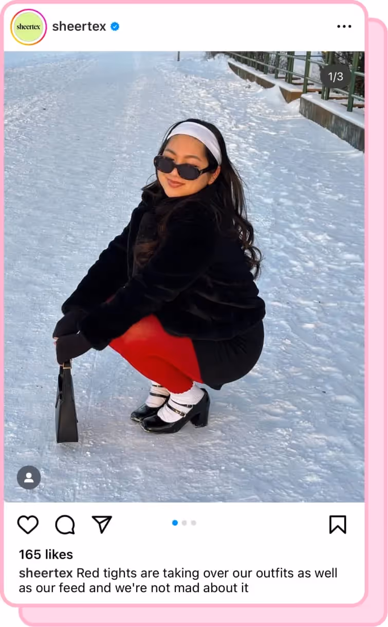 girl wearing red sheertex tights and black jacket