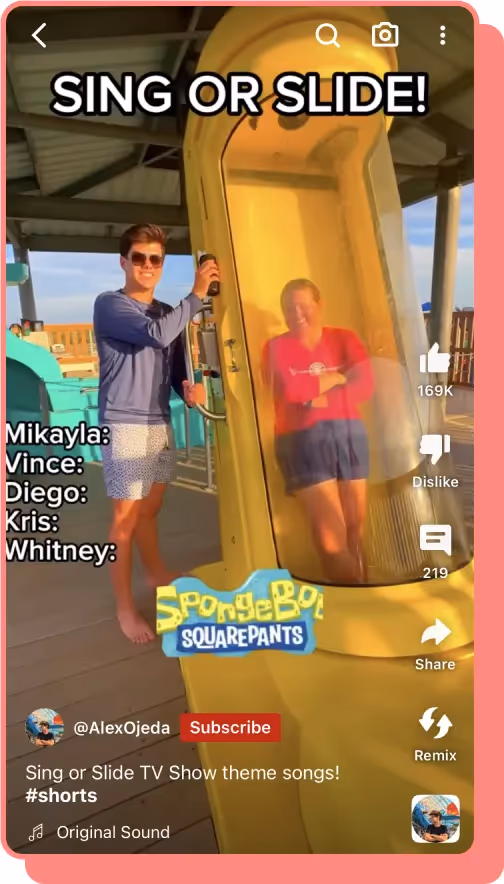 man interviews people going down waterslide