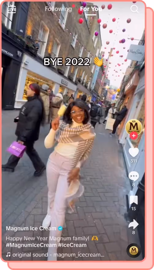 woman holding magnum bar saying bye 2022