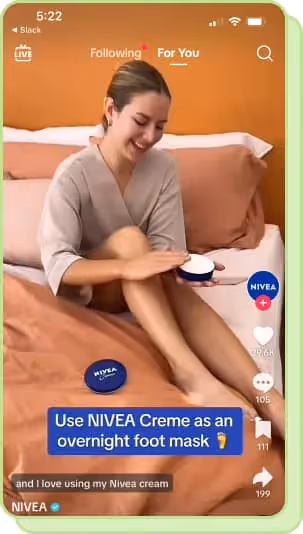 woman applying nivea creme