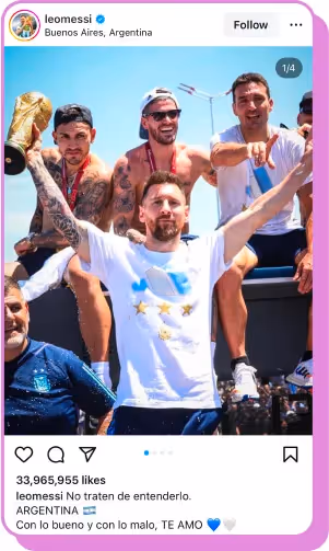 Soccer player celebrating with teammates on an open-top bus holding the FIFA World Cup trophy