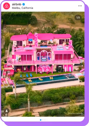 A vibrant pink Barbie Dreamhouse-style mansion with a pool spelling "KEN" in Malibu, listed on Airbnb