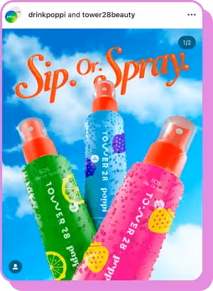 Brightly colored Tower 28 x Poppi facial sprays styled like soda bottles against blue sky.