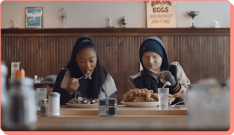 Ed Sheeran eating with woman in diner in Shape of You, a most viewed YouTube video.