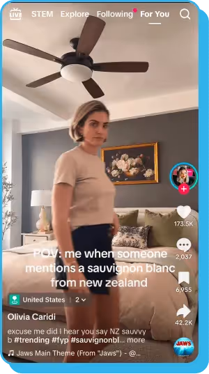 Woman turns dramatically in a bedroom with caption about New Zealand sauvignon blanc.