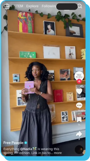 Woman in black dress promoting a book in a TikTok influencer marketing video for Free People.