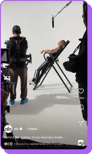 Behind-the-scenes of Alo shoot showing woman in recovery chair on set