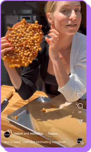 Molly Baz holding up chickpea brittle in kitchen collab with Mejuri