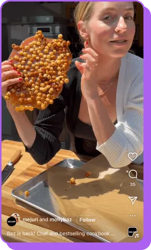 Molly Baz holding up chickpea brittle in kitchen collab with Mejuri