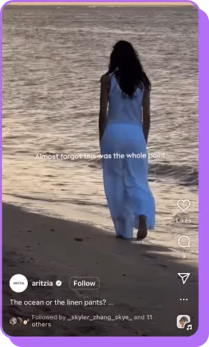 Woman in white linen walking along beach in serene Aritzia ocean clip