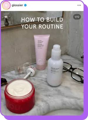 Glossier skincare products on marble counter with “How to Build Your Routine” text
