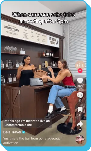 TikTok video of two women chatting at a bar with text about late meetings.