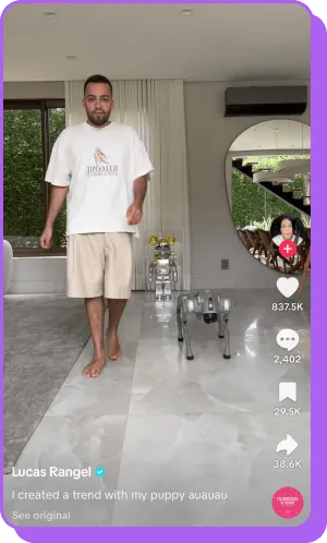 Man in casual outfit dancing with a robot dog in a modern living room 