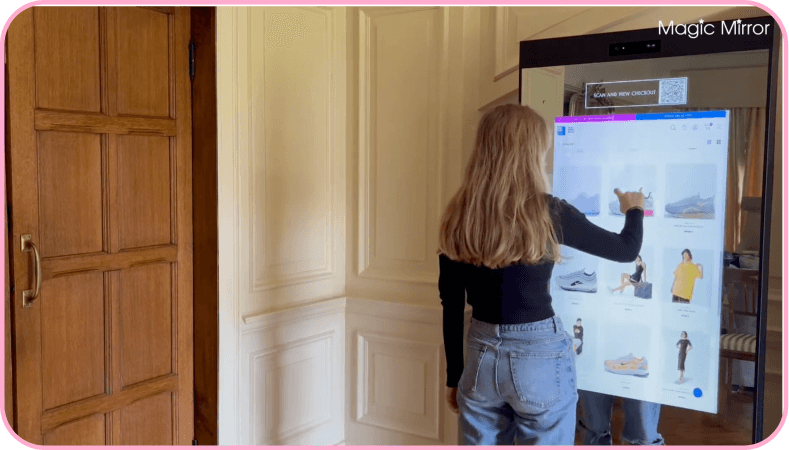 Woman using interactive smart mirror to browse fashion products in-store