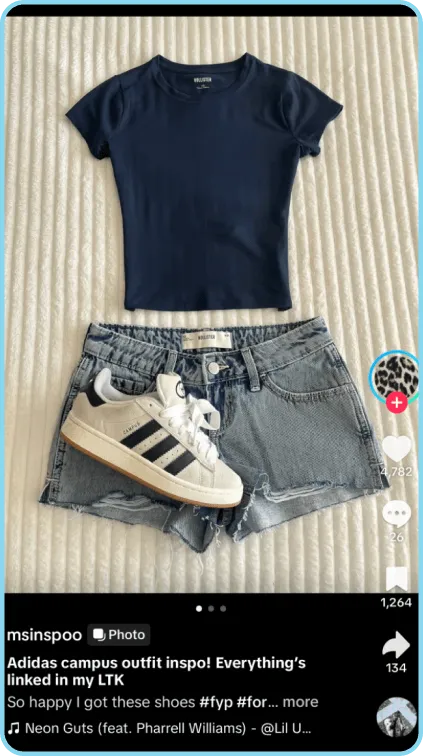 Flat lay of black tee, denim shorts, and Adidas Campus sneakers styled for back-to-school.