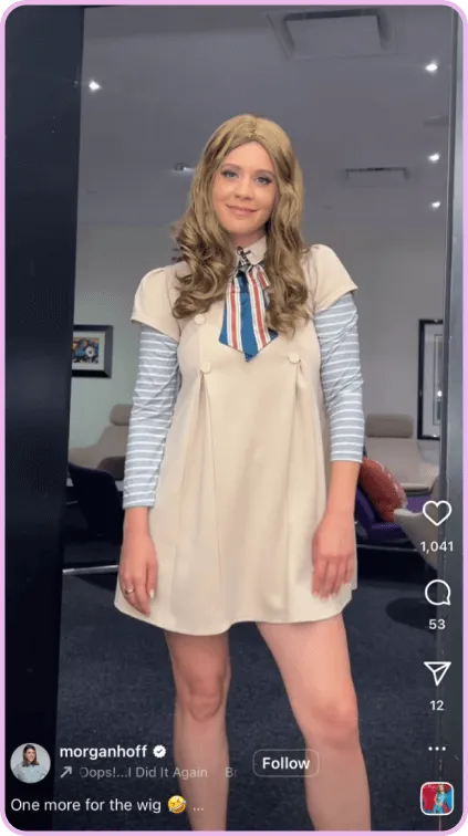 Woman wears retro-style dress and wig, smiling in a lounge with caption about wigs.