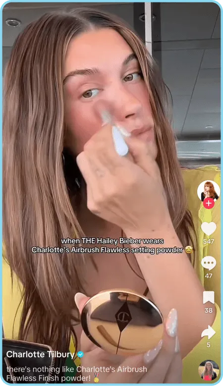 hailey bieber applying Charlotte Tilbury powder in TikTok video