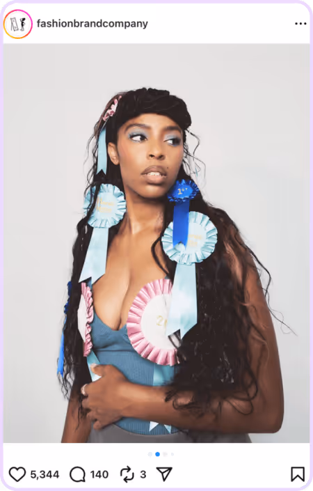Woman wearing pastel ribbon rosettes pinned to top and hair against white background