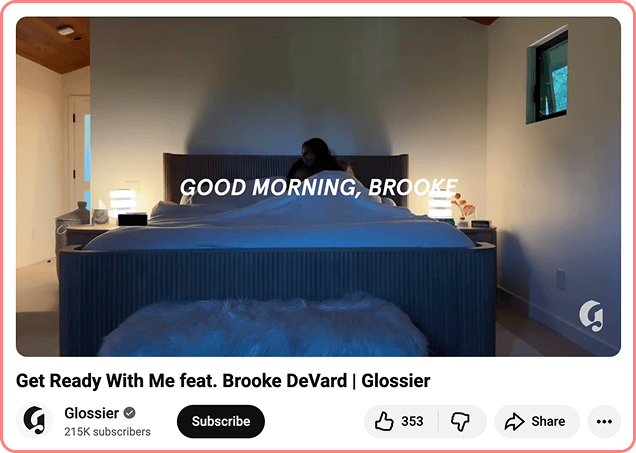 Woman sitting up in bed during morning routine video featuring creator Brooke DeVard