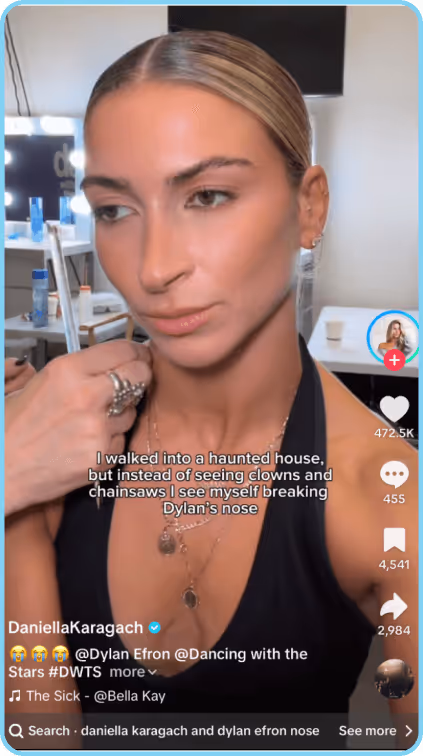 Woman in black halter top with slicked hair sits at a vanity with text overlay.