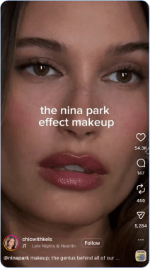 Close-up of woman wearing glossy Nina Park-inspired makeup look