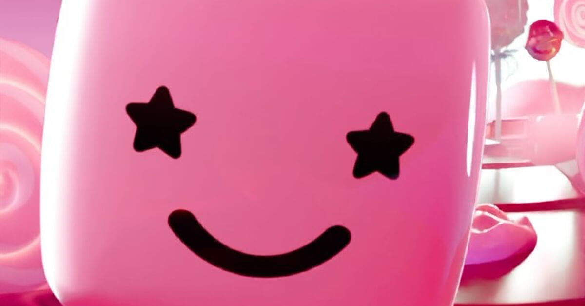 close up pink smiley face with star shaped eyes