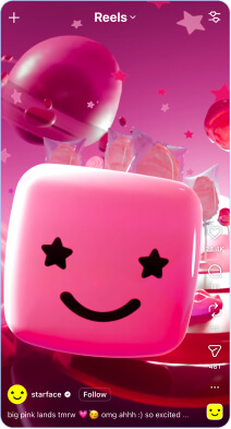 pink cube with a smiley face with star eyes