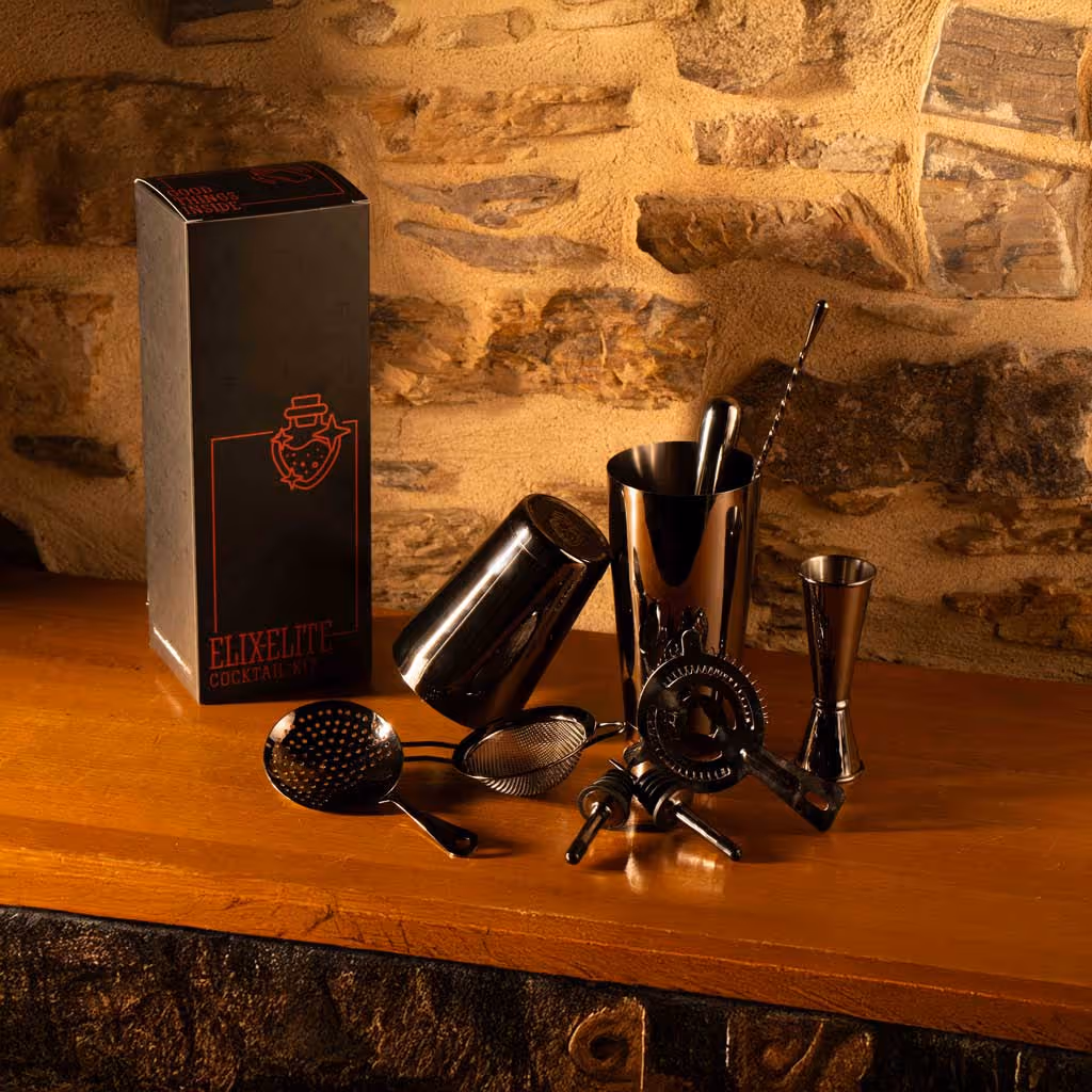 A box of Elix-Elite Cocktail kit sits on a wooden table.