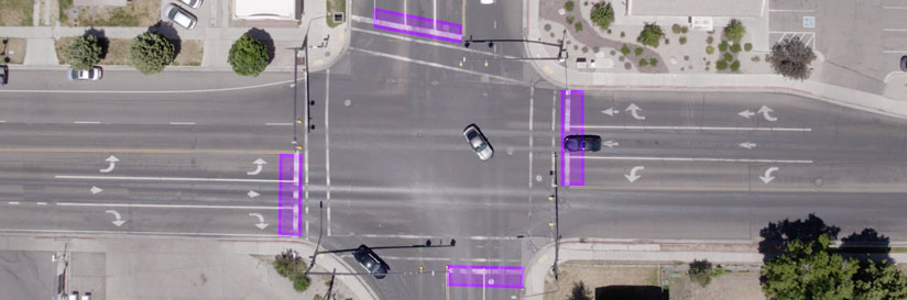 Overhead image of intesection highlighting stop bar detection zones on all four approaches