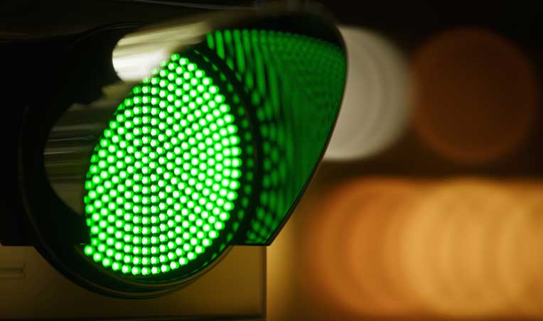 closeup image of a green traffic light