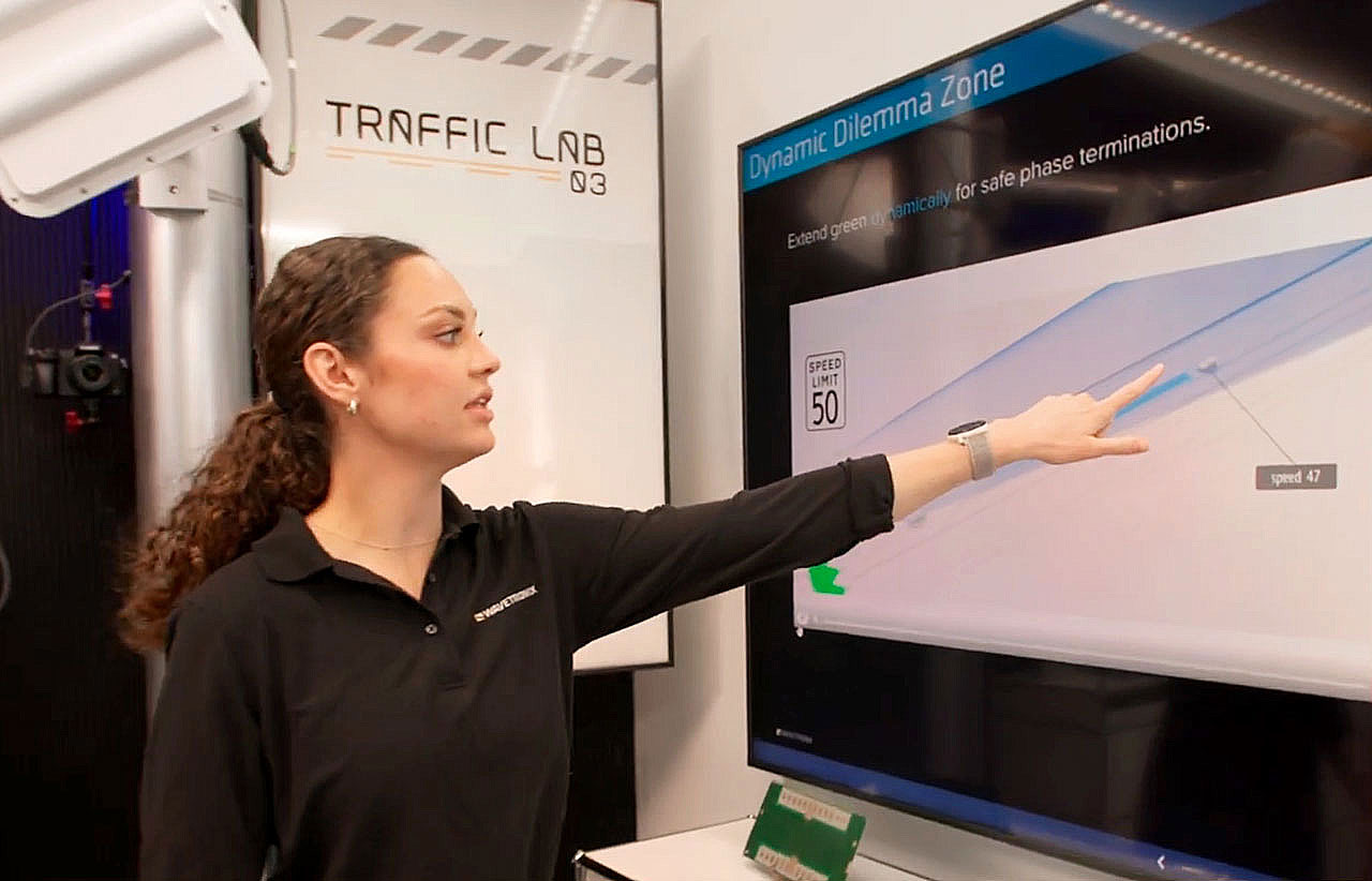Image of woman discussing benefits of dynamic dilemma zone protection in the Traffic Lab