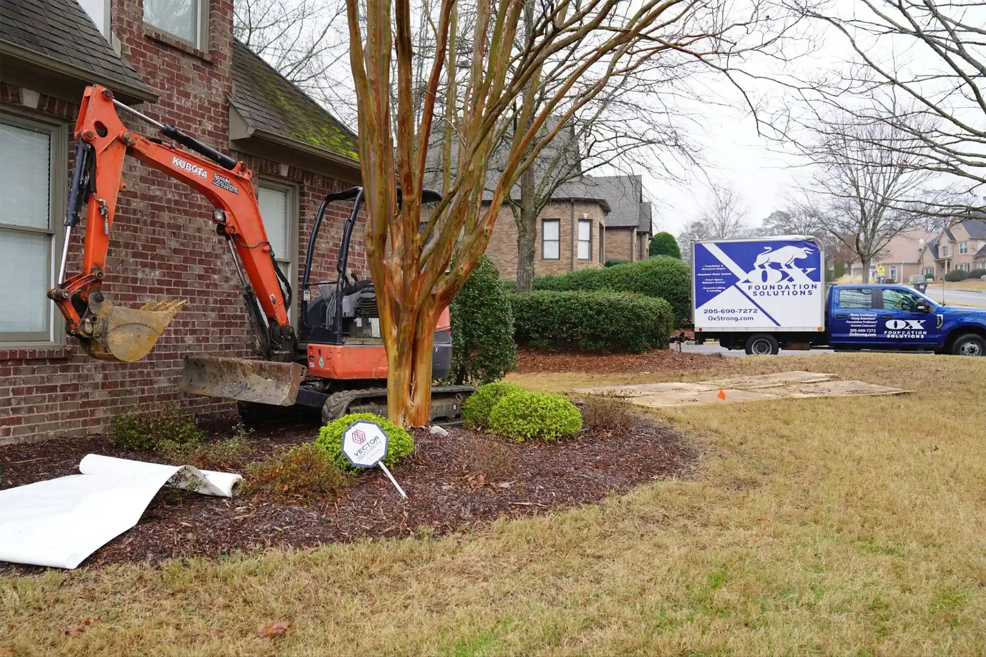 Foundation repair service page banner showing pier installation and stabilization work in Alabama home