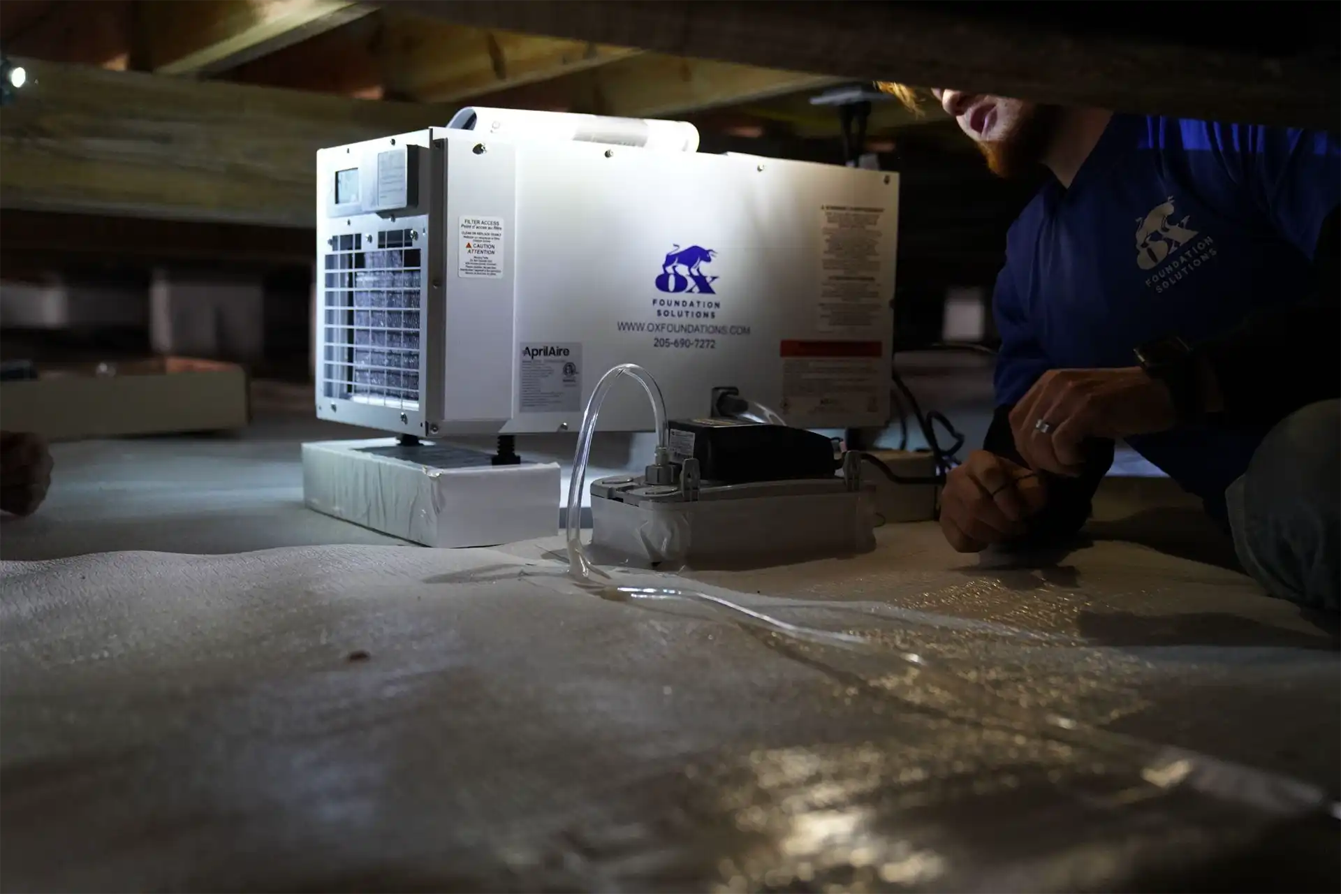 Moisture control service page banner showing dehumidifier and vapor barrier solutions for Alabama homes