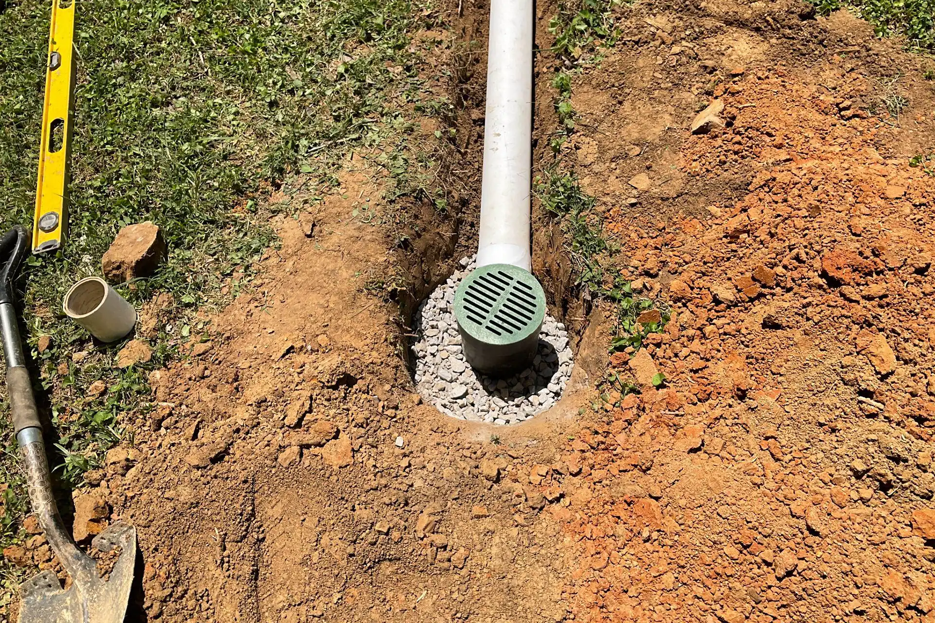 Interior view of clogged drain pipe system requiring professional cleaning and repair in Alabama home