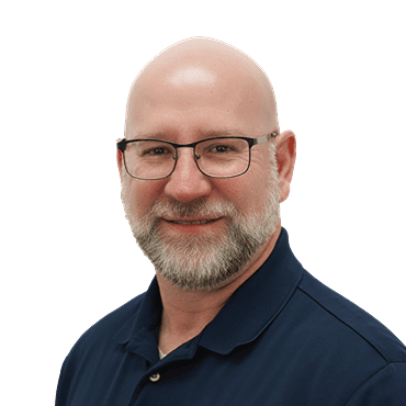 Ox Foundation Solutions team member headshot, bald man with glasses and beard wearing a navy polo