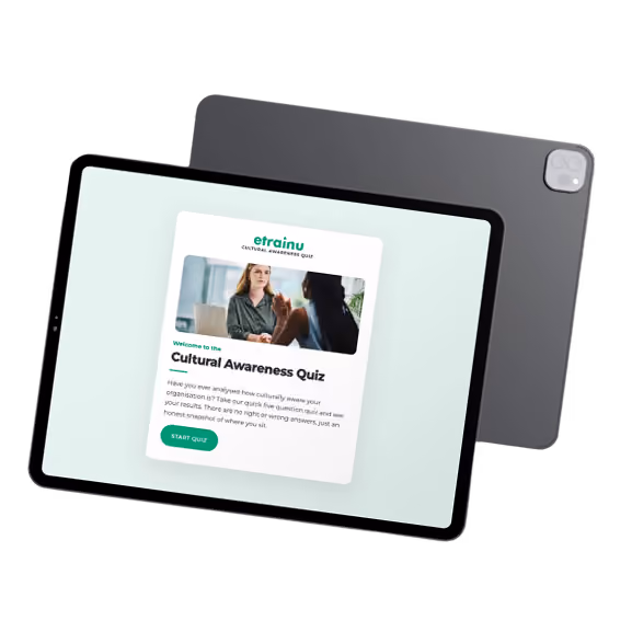 Tablet displays Cultural Awareness Quiz webpage with two people shaking hands in the image.