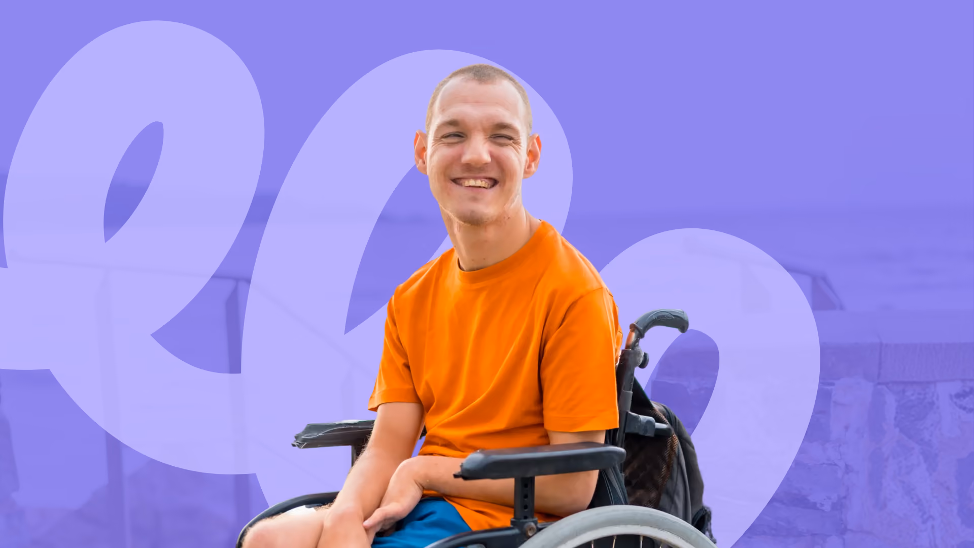 Smiling young man in a wheelchair — NDIS restrictive practices online training for disability support workers