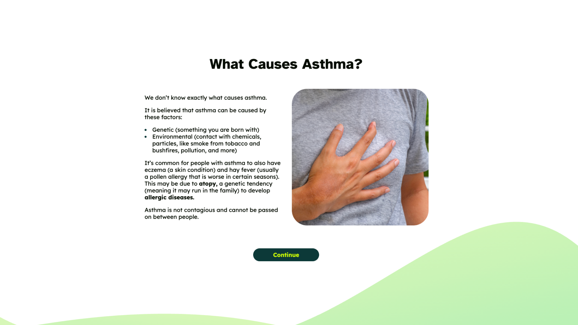 A person rests a hand on their chest over a grey t-shirt, next to text explaining what causes asthma.
