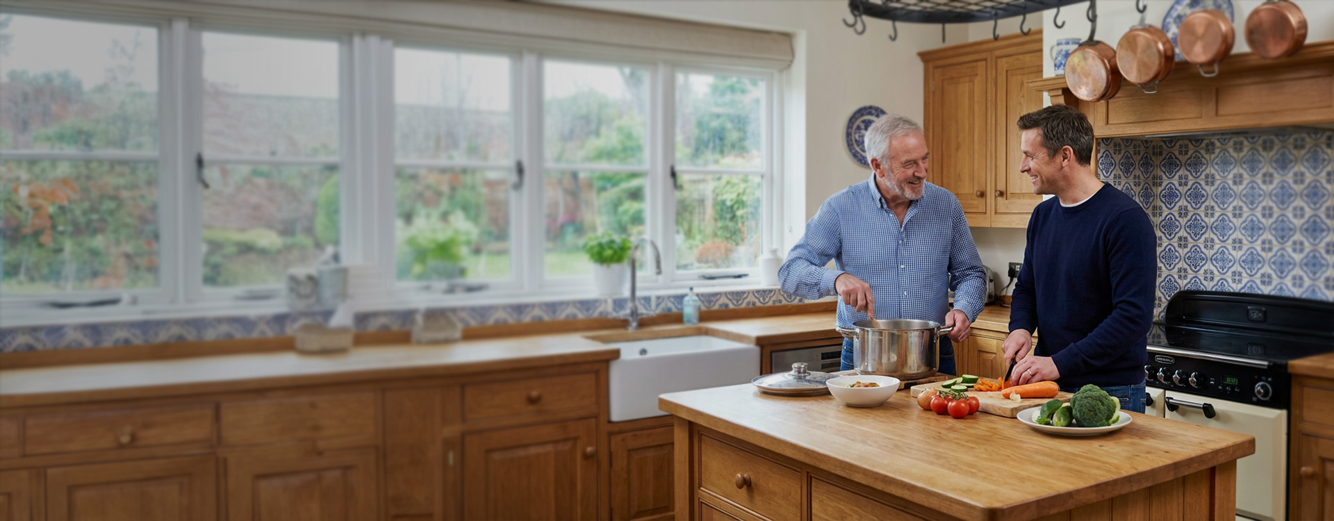 Father and son cooking the kitchen
