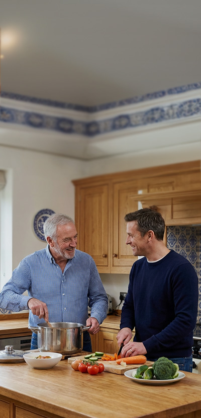 Father and son cooking the kitchen