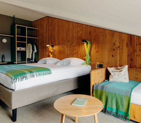 Relaxing under the comforter at PLANB Living Chamonix the perfect place to recharge your batteries